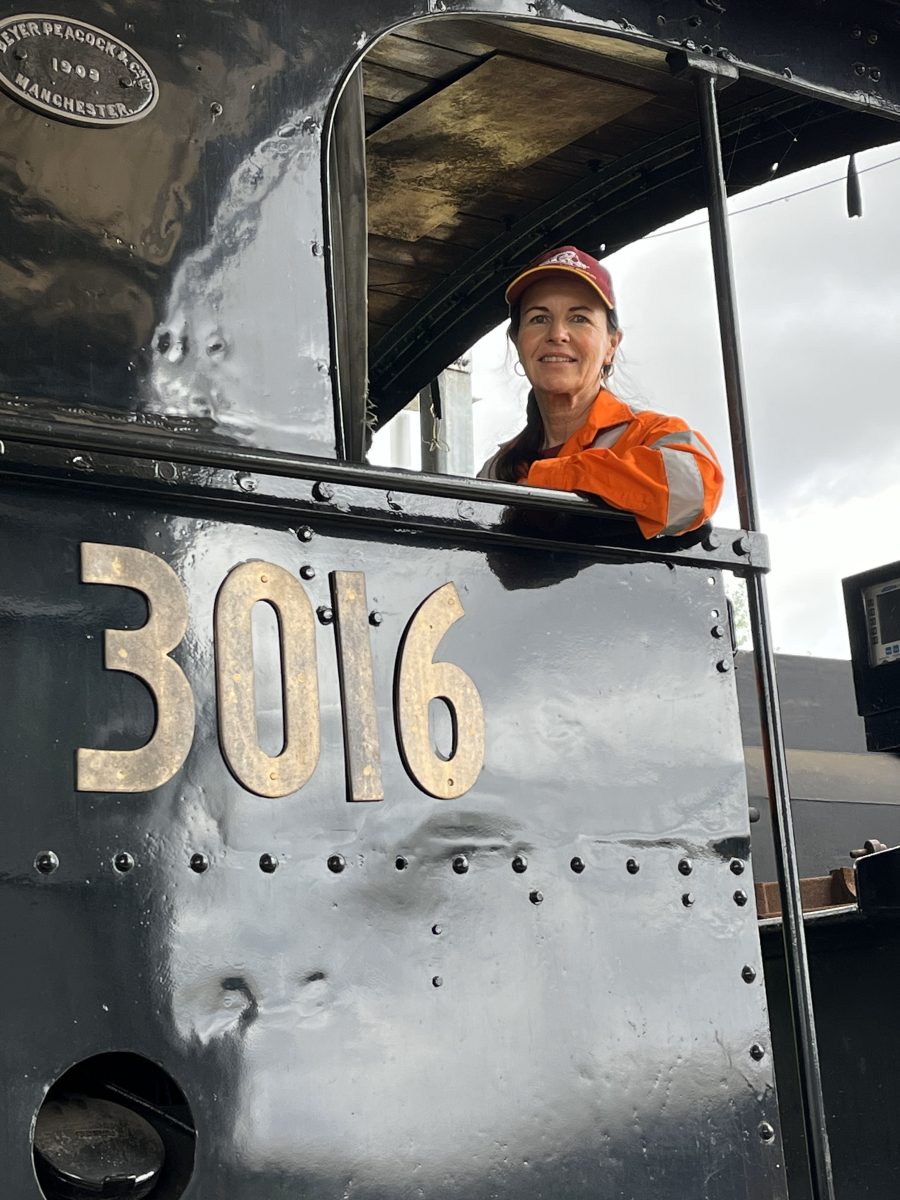 Jane Wheaton, in the driver's seat of the museum's 3016, a C30 class steam locomotive.