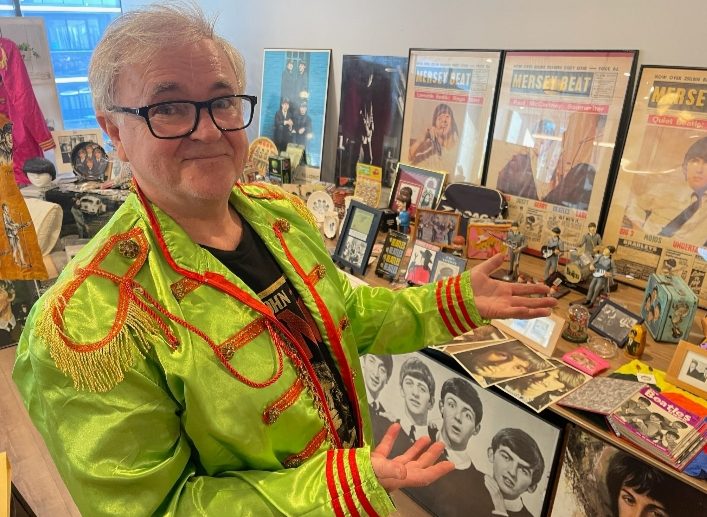 Beatles fan Dallas Atkins with Beatles collection