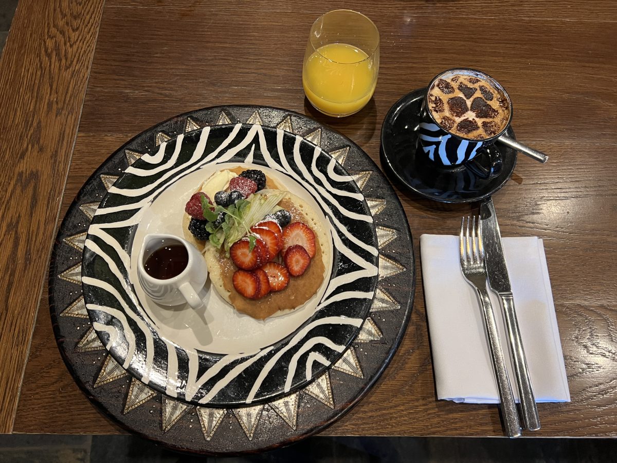 plate of pancakes and a cup of coffee