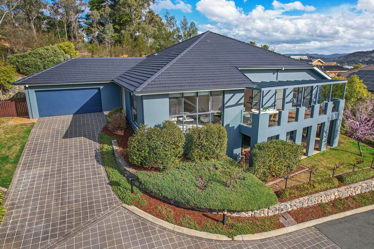 aerial photo of blue house