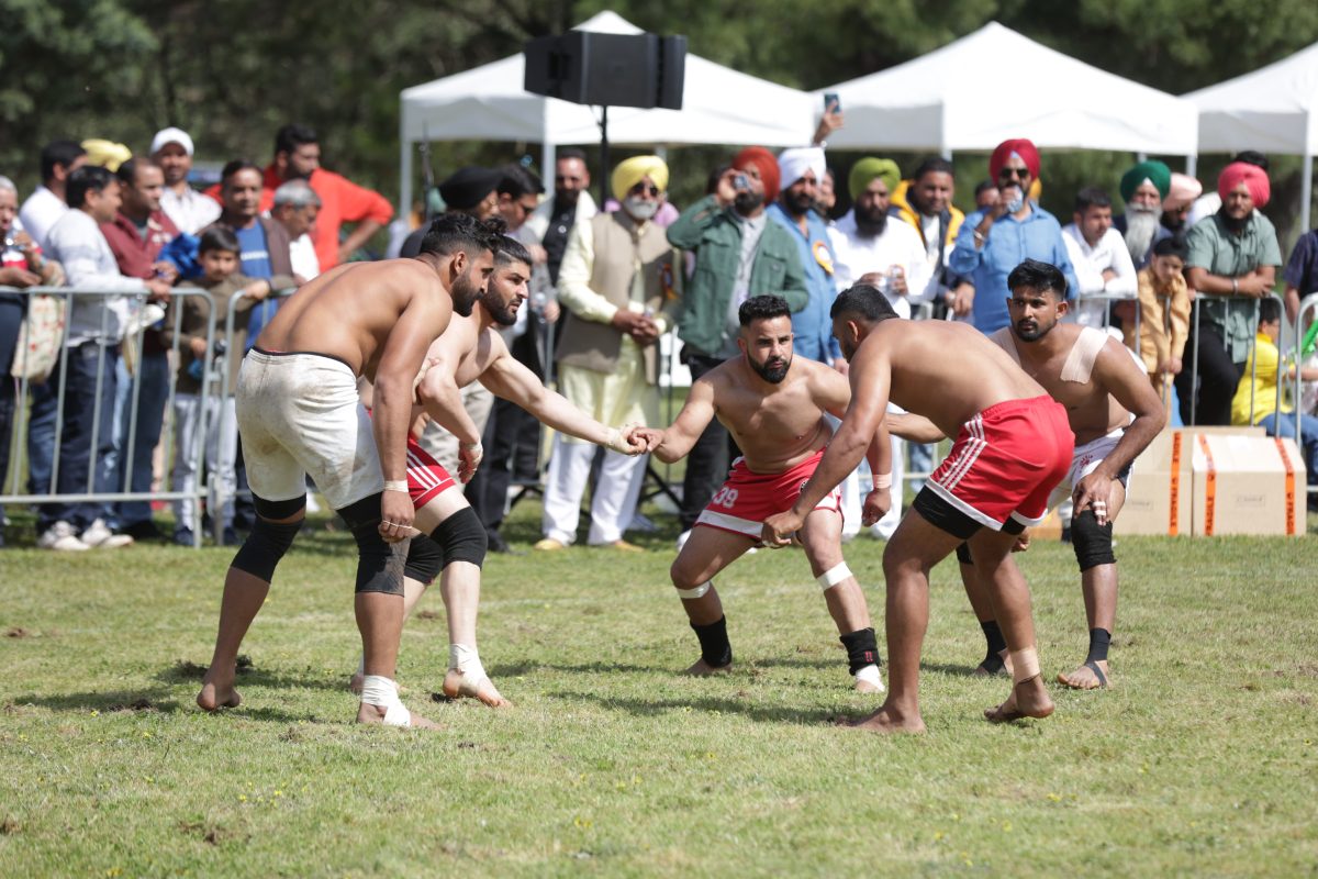 Men playing Kabbadi, a sport similar to wrestling