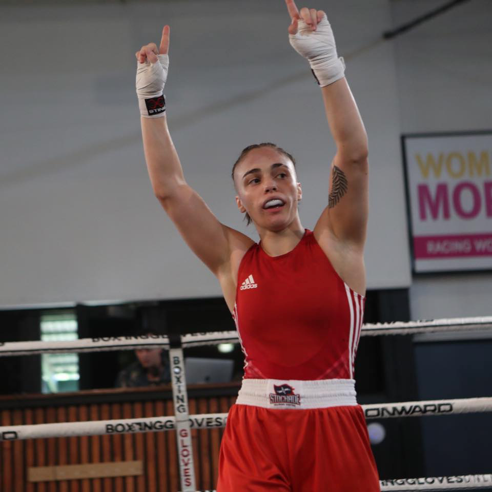 female boxer celebrating