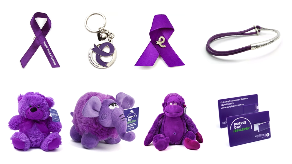 Branded promo products for Epilepsy ACT: Ribbon, keyring, bracelet, cuddly toys and USB card.