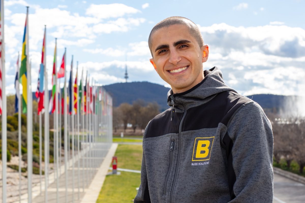 Man standing outside looking at camera