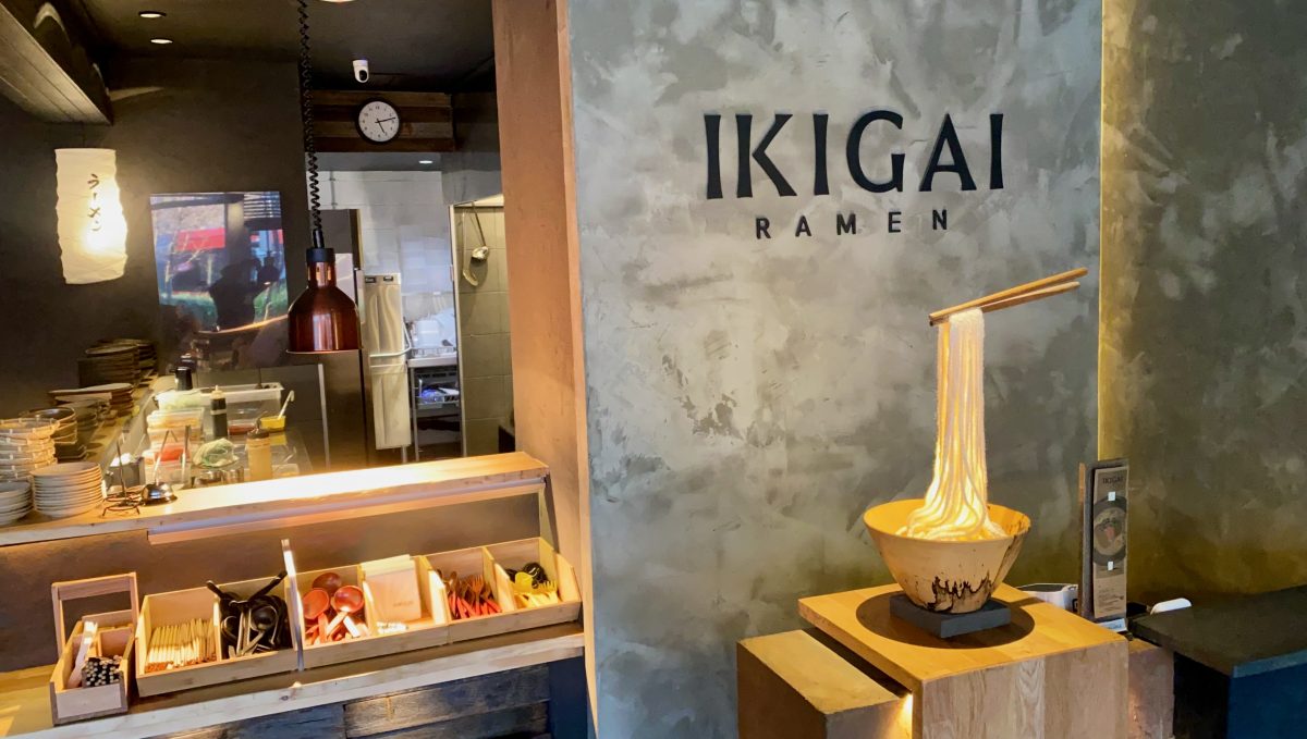 Ikigai interior with lit up statue of noodles on chopsticks