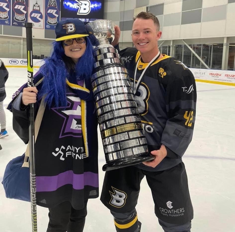 Emma Easton and Jackson Gallagher with a trophy