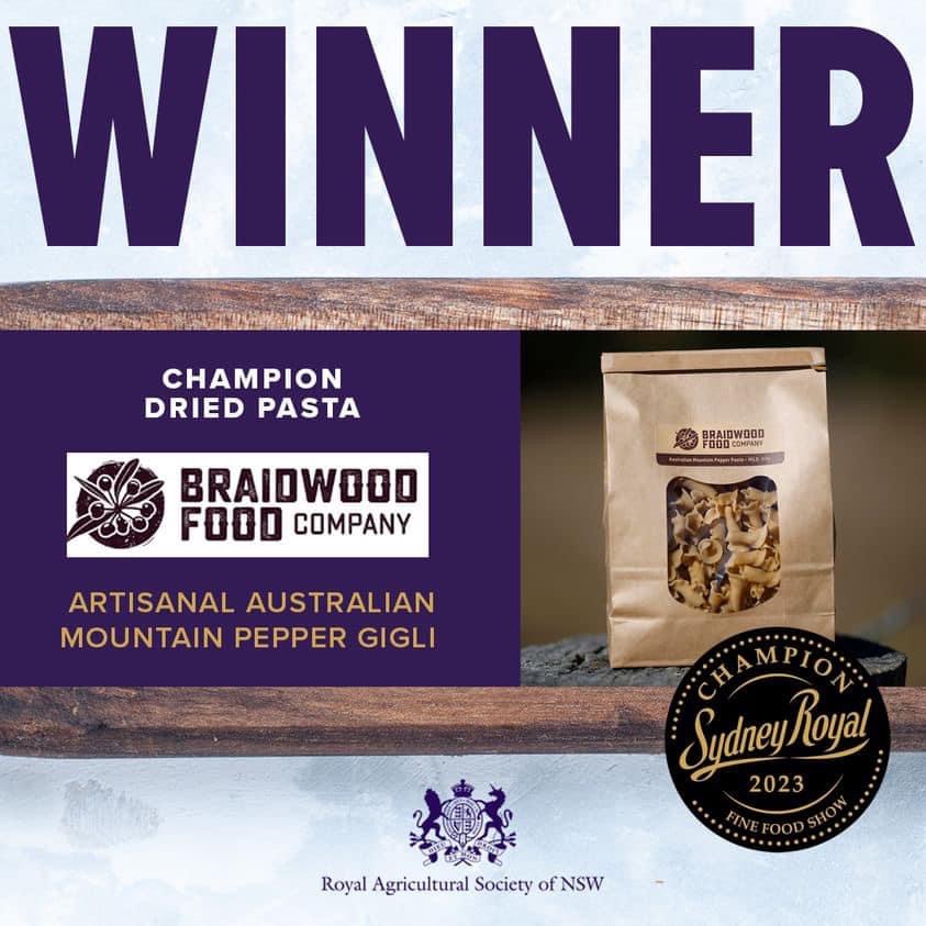 Graphic saying "winner, Champion Dried Pasta" with an image of pasta, business logo and competition logos.