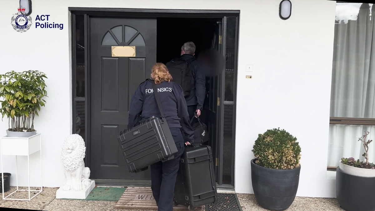 Police officers executing a search warrant