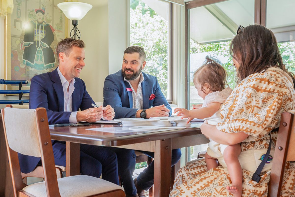 Will Honey, Matt Goodwin and a woman with child talk at a dining table
