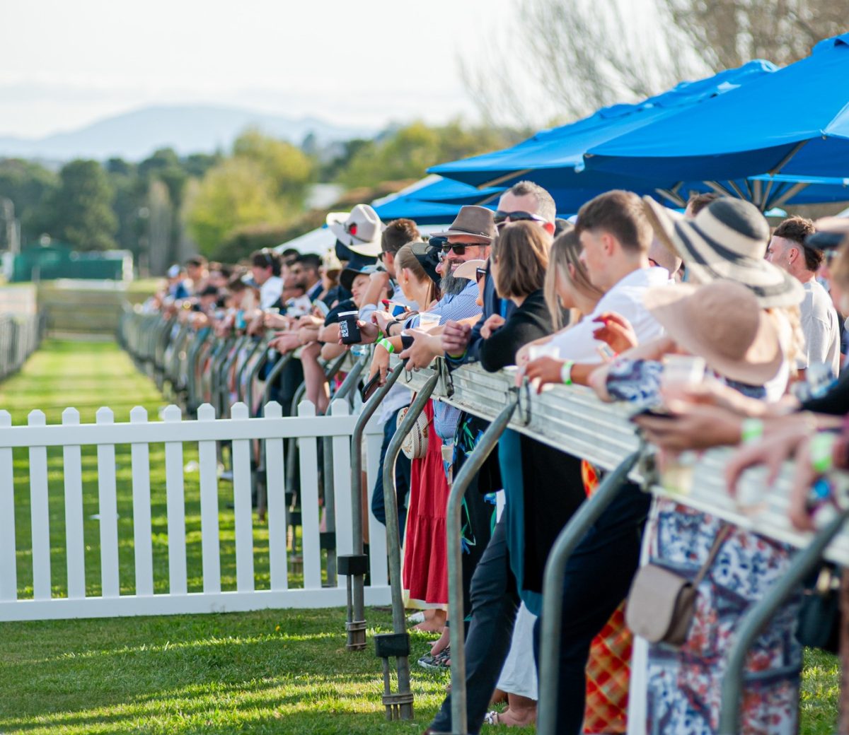 People dressed up for race day at Thoroughbred Park. Photo: Thoroughbred Park.