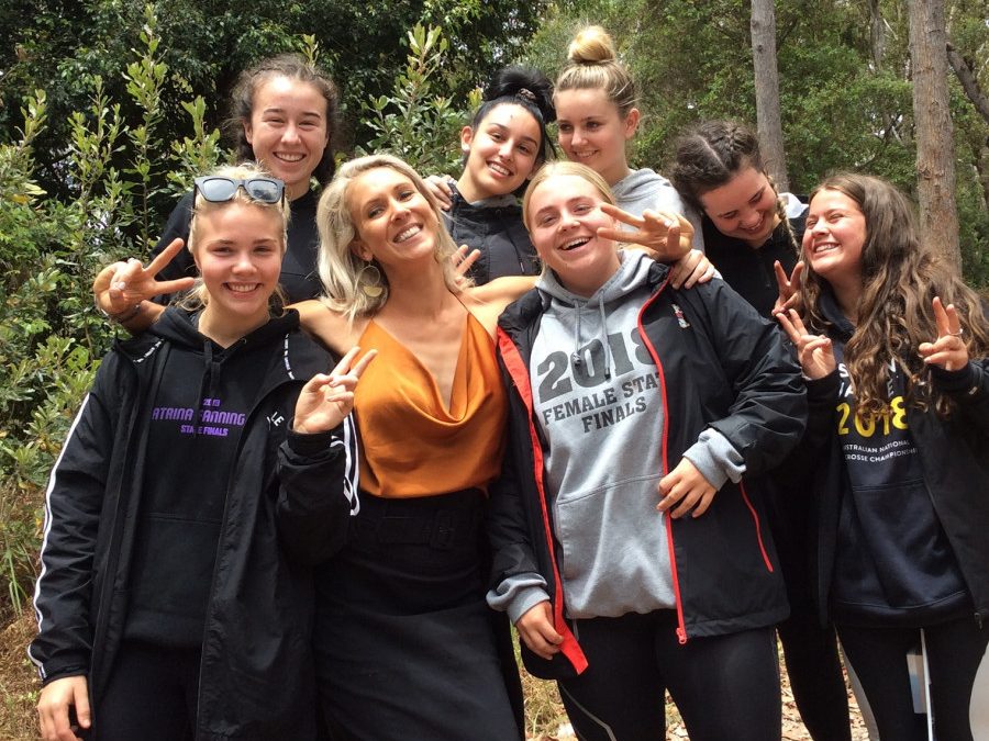 Jacinta Dubojski with a group of young girls