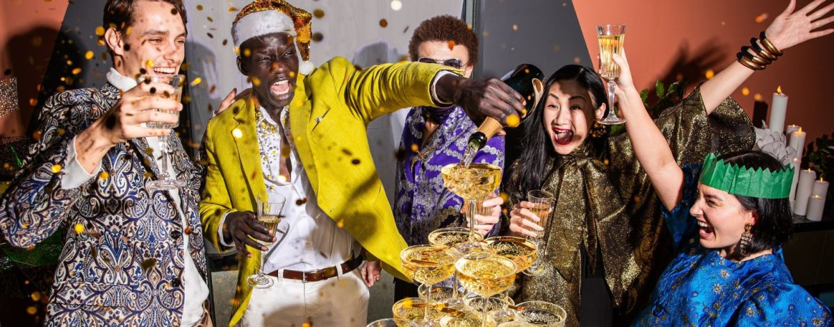 people partying and pouring champagne
