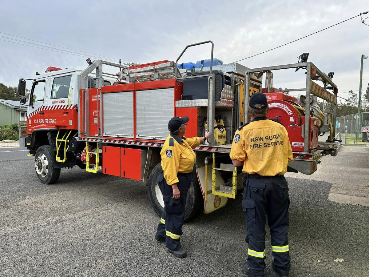 Firefighters with fire truck