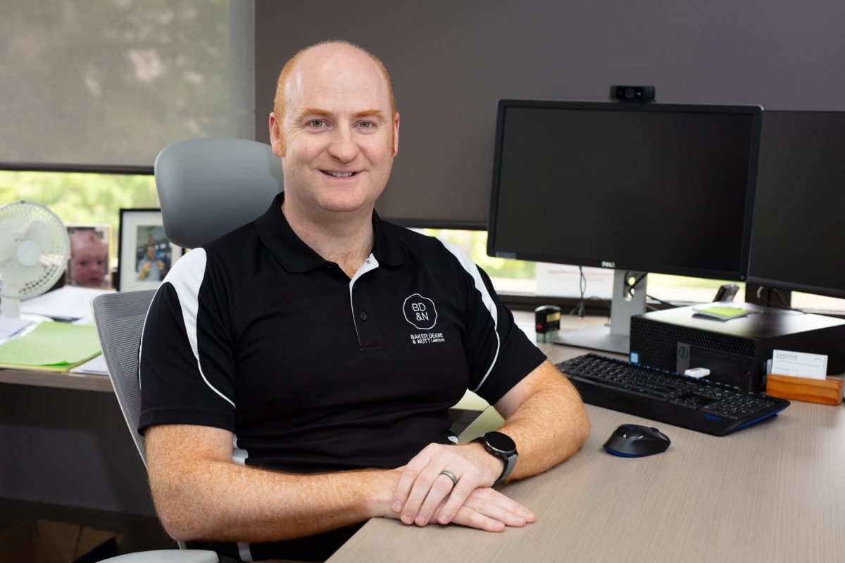 a man sitting at an office desk