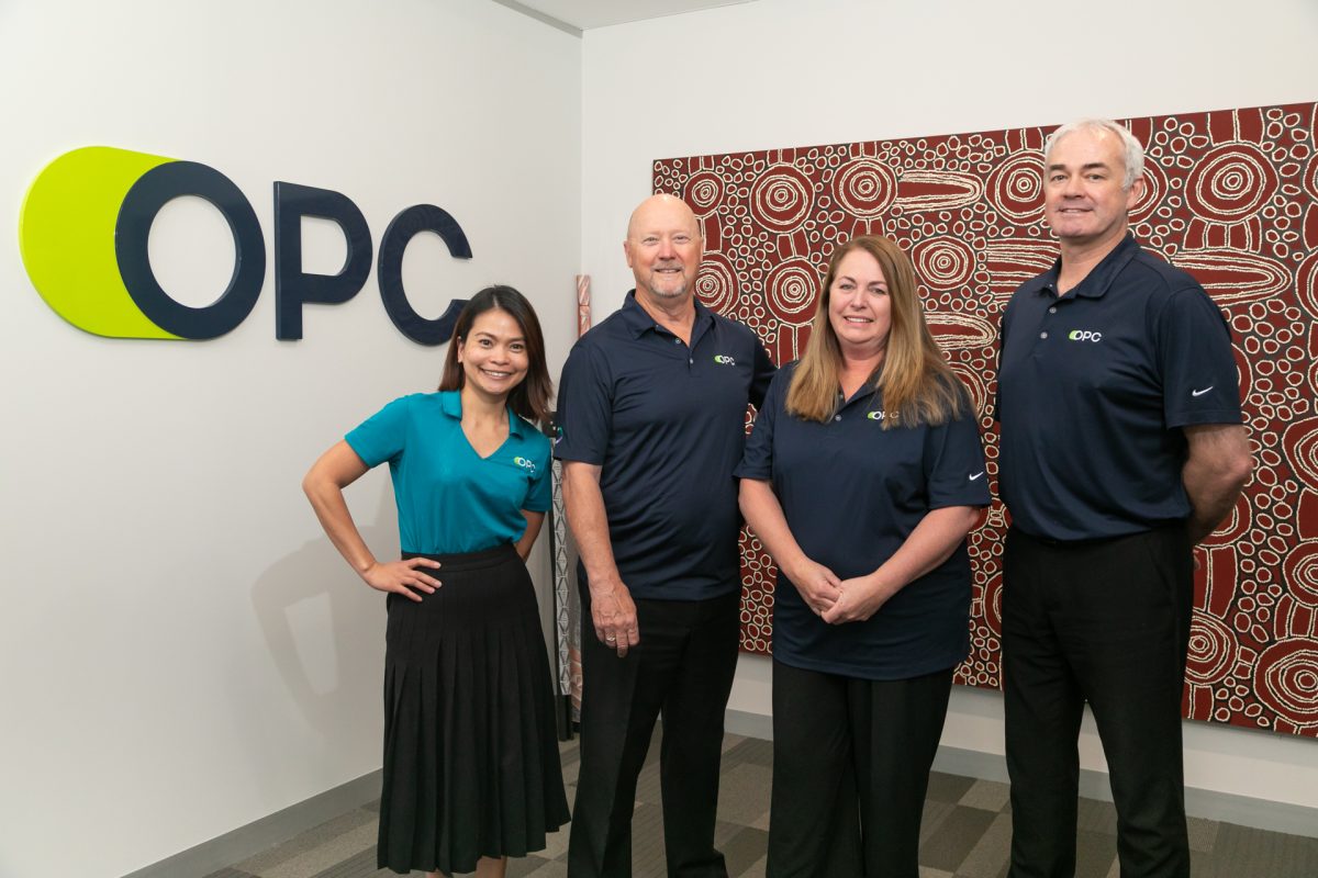 Group in front of OPC sign