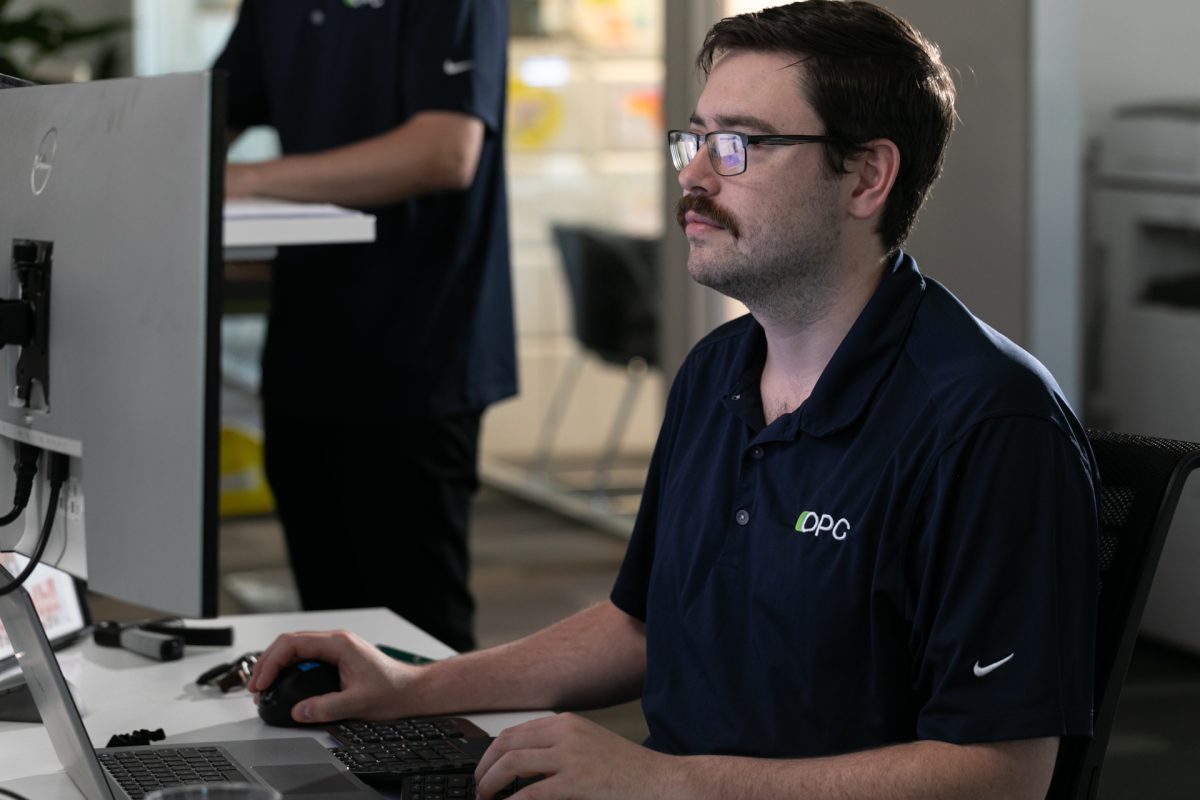 Man in front of computer screen