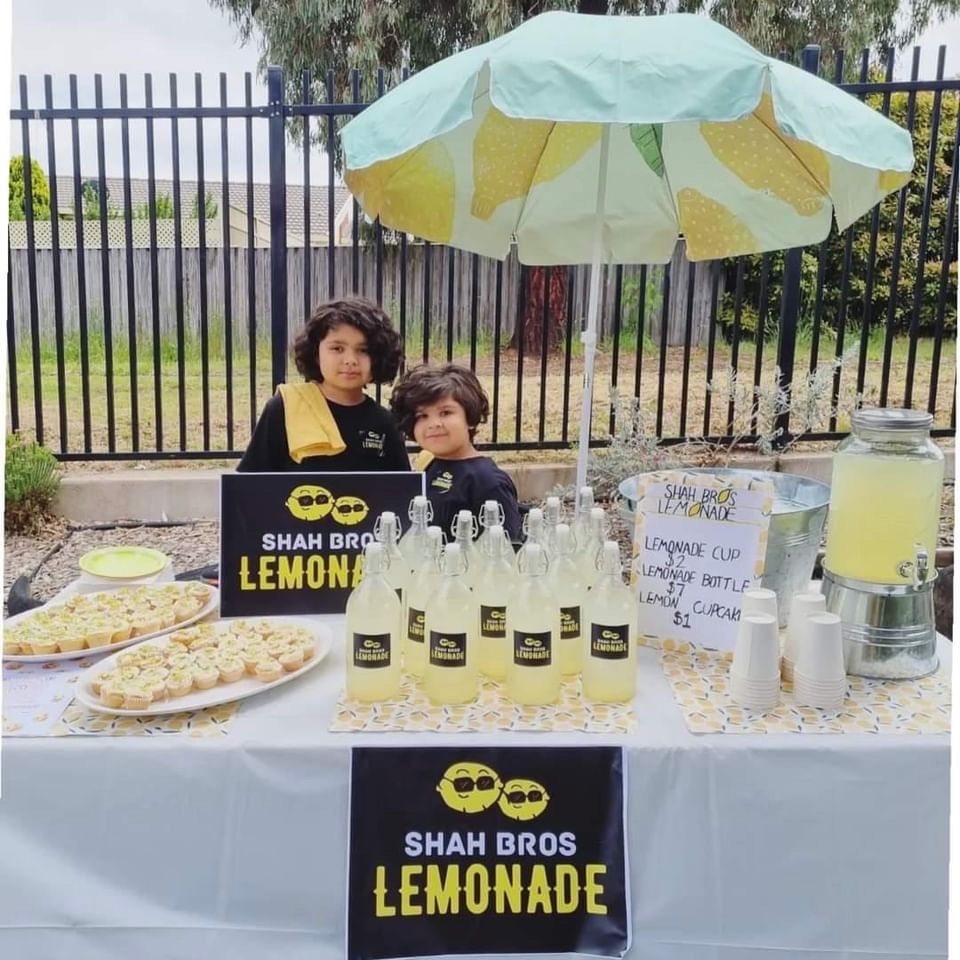 Yusuf and Noah with their lemonade stall.