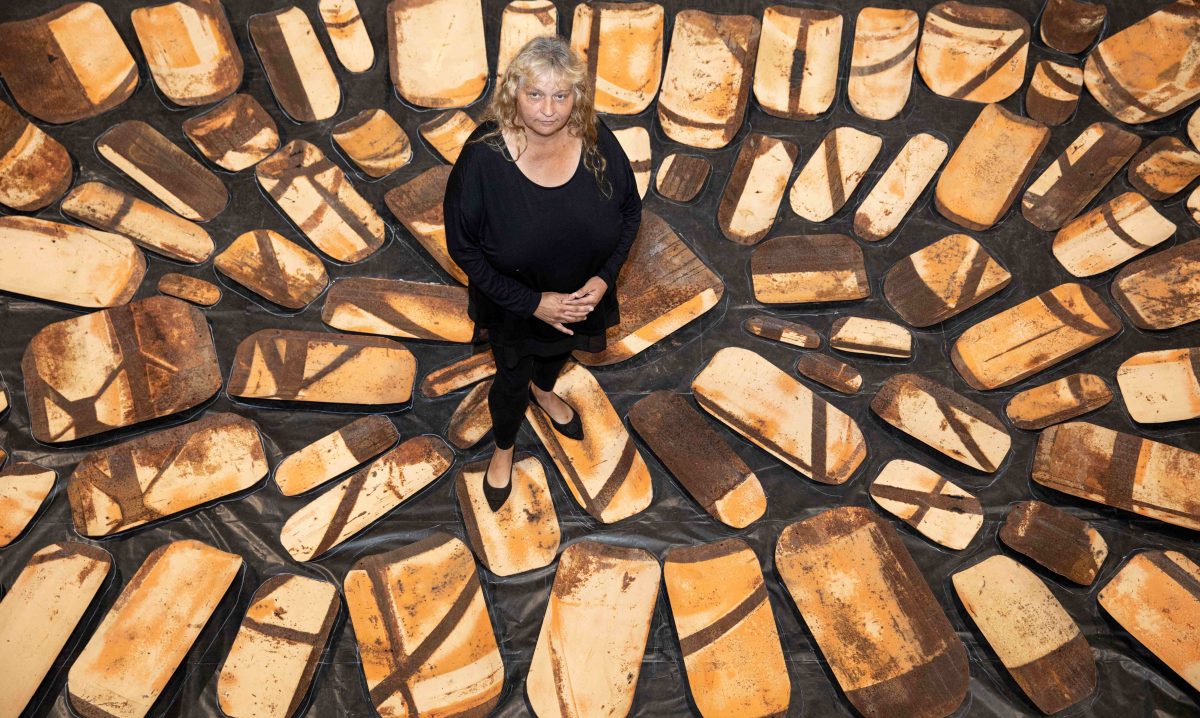 Woman standing in art installation