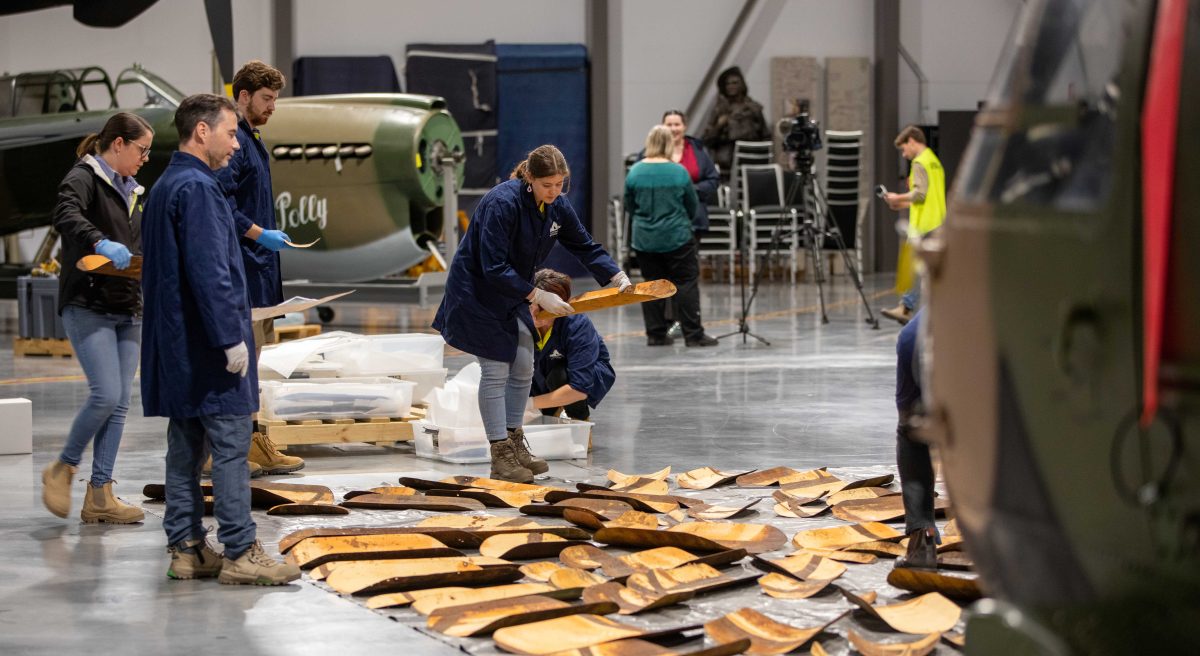 Curators install large artwork