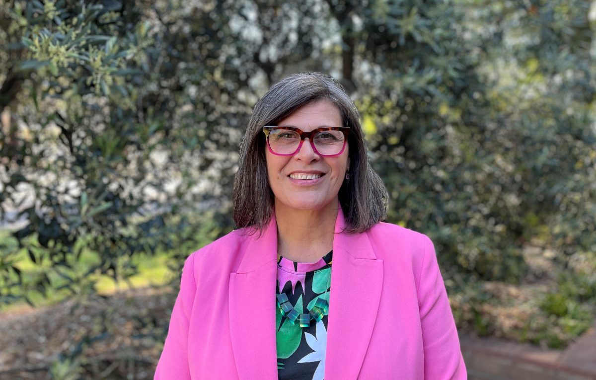 Woman in pink blazer