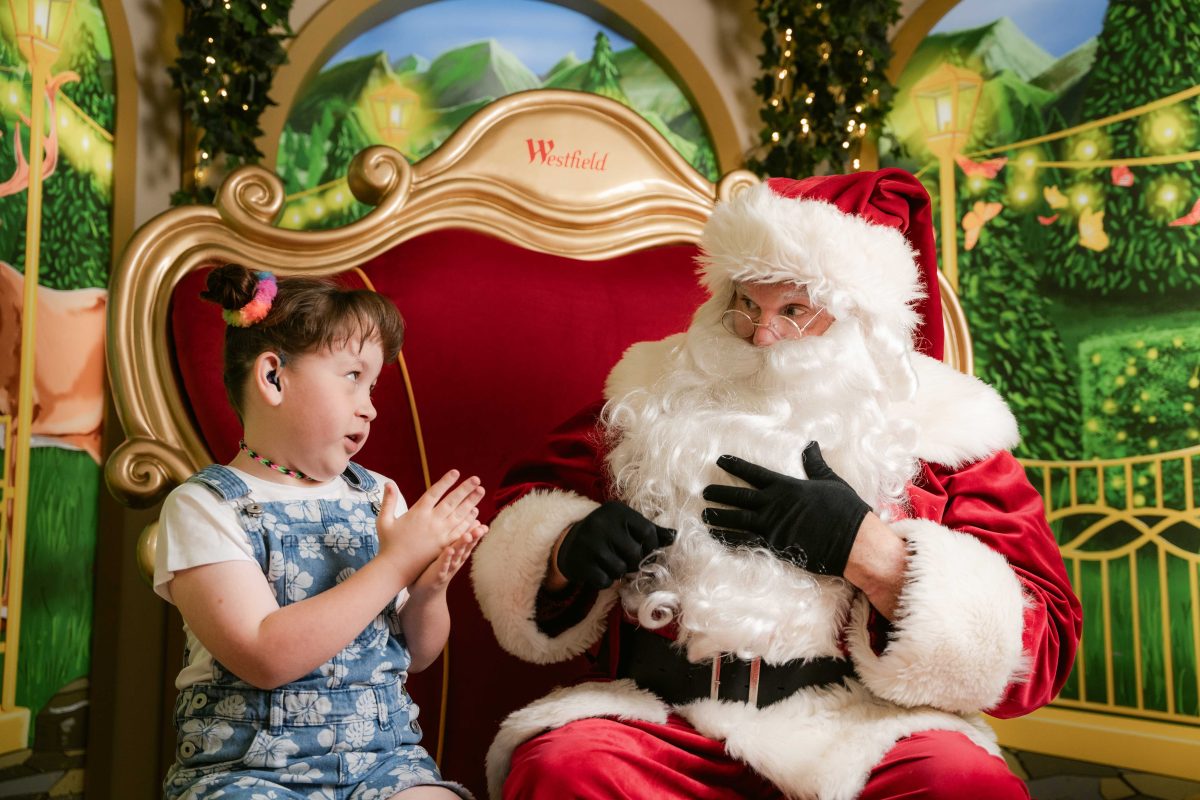 Auslan Santa with a little girl