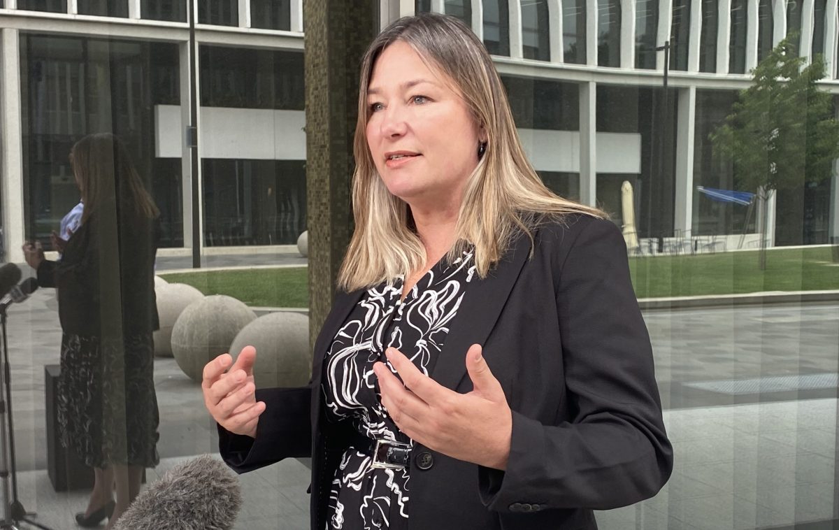 woman giving press conference