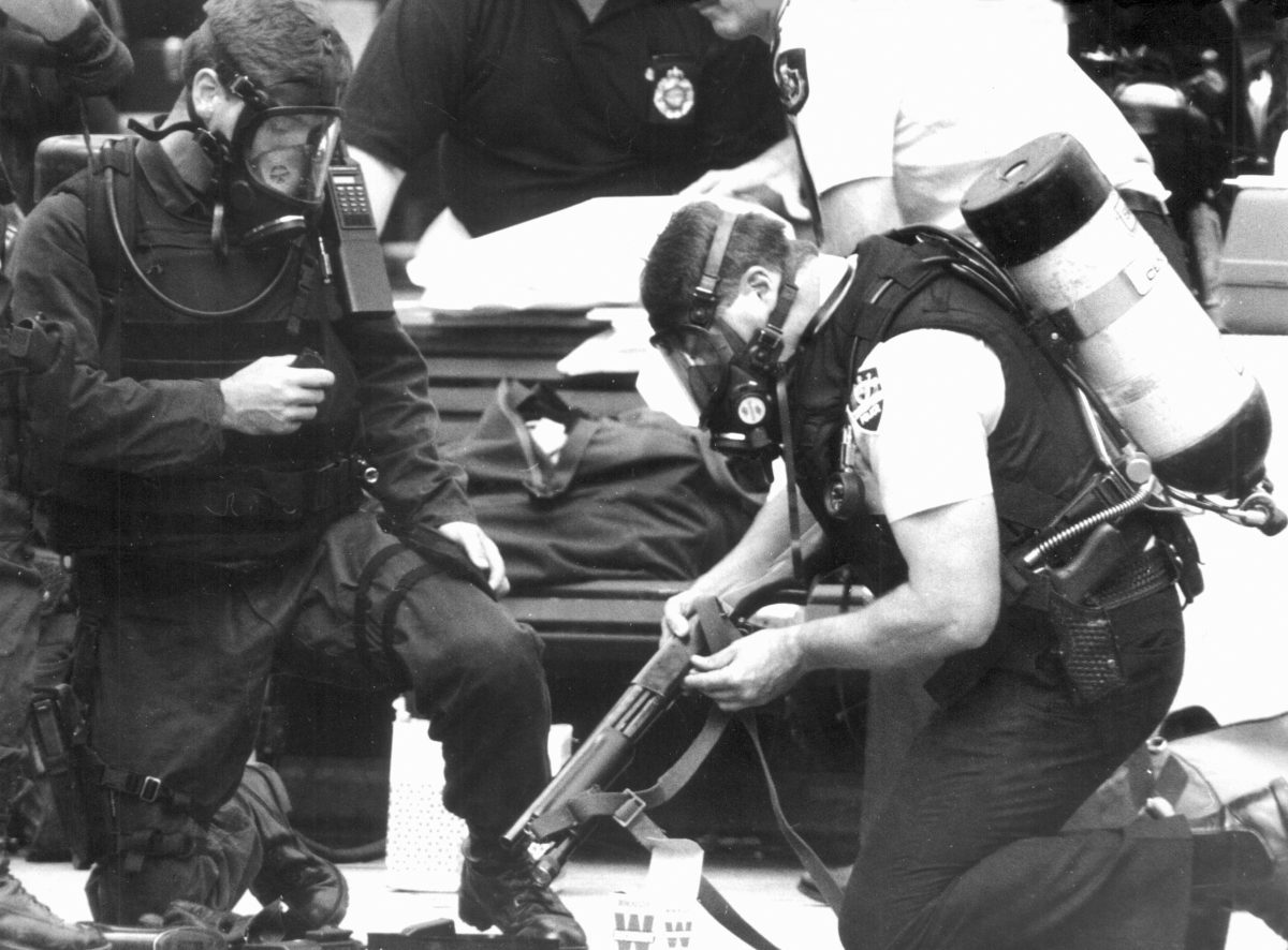 police officer loading firearm 