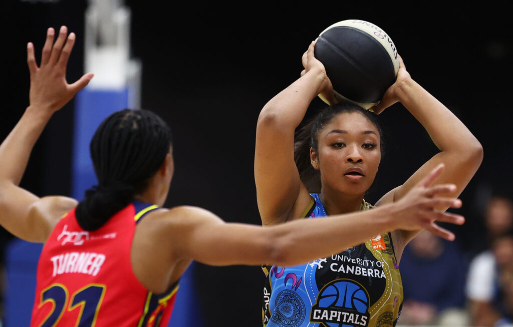 Monica Okoye playing basketball