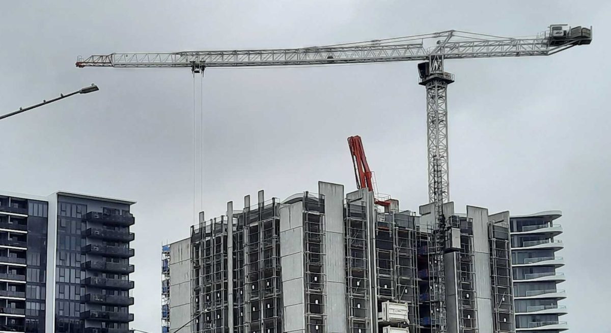 Apartment construction and crane