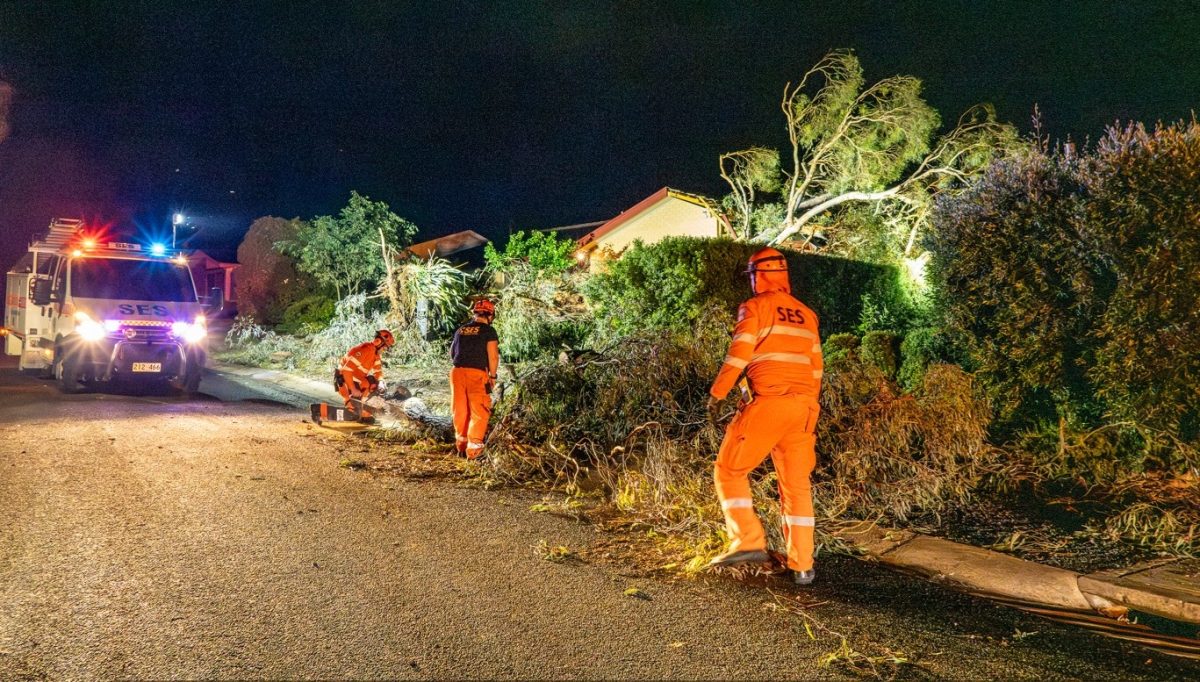 ACT SES crews cleaning up storm damage at night