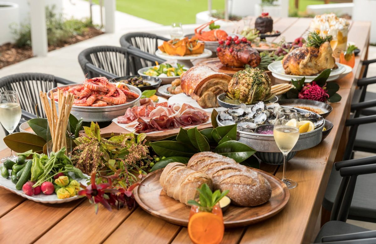 Christmas Feast set up on a communal table at an apartment block in Canberra