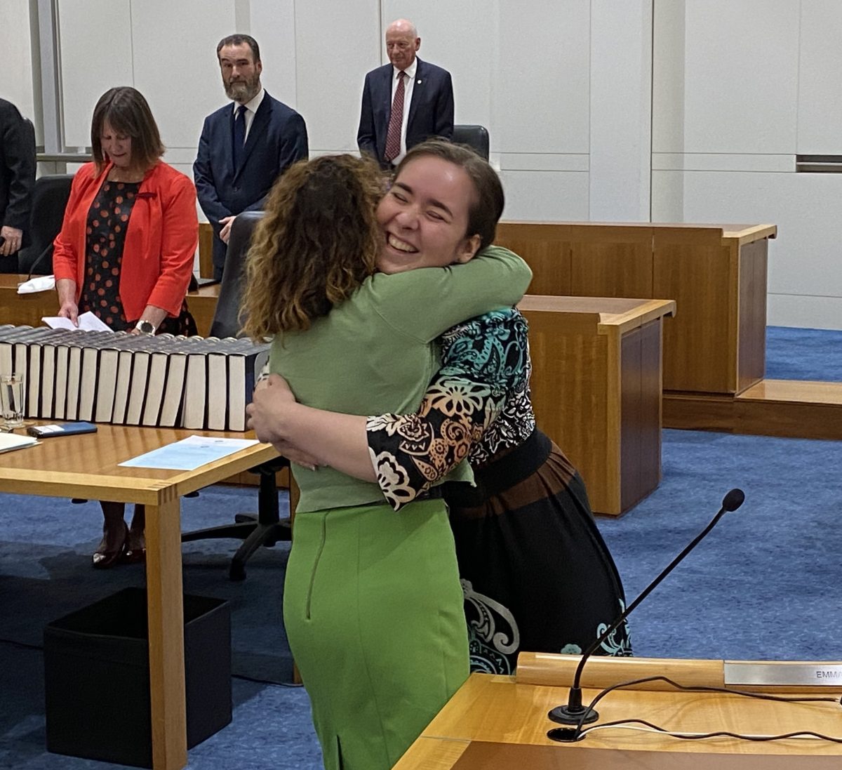 Laura Nuttall being hugged by Rebecca Vassarotti