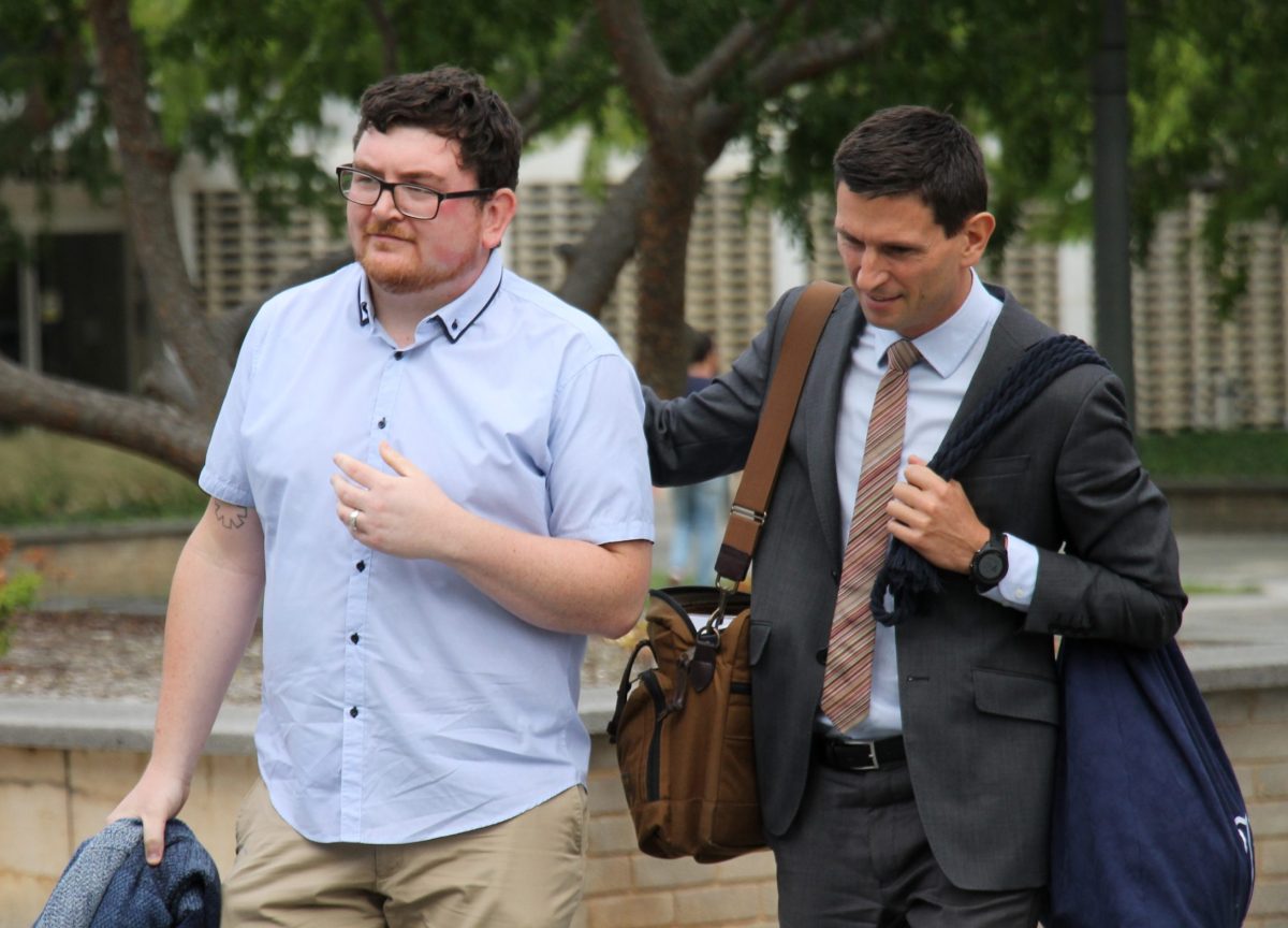 two men walking to court