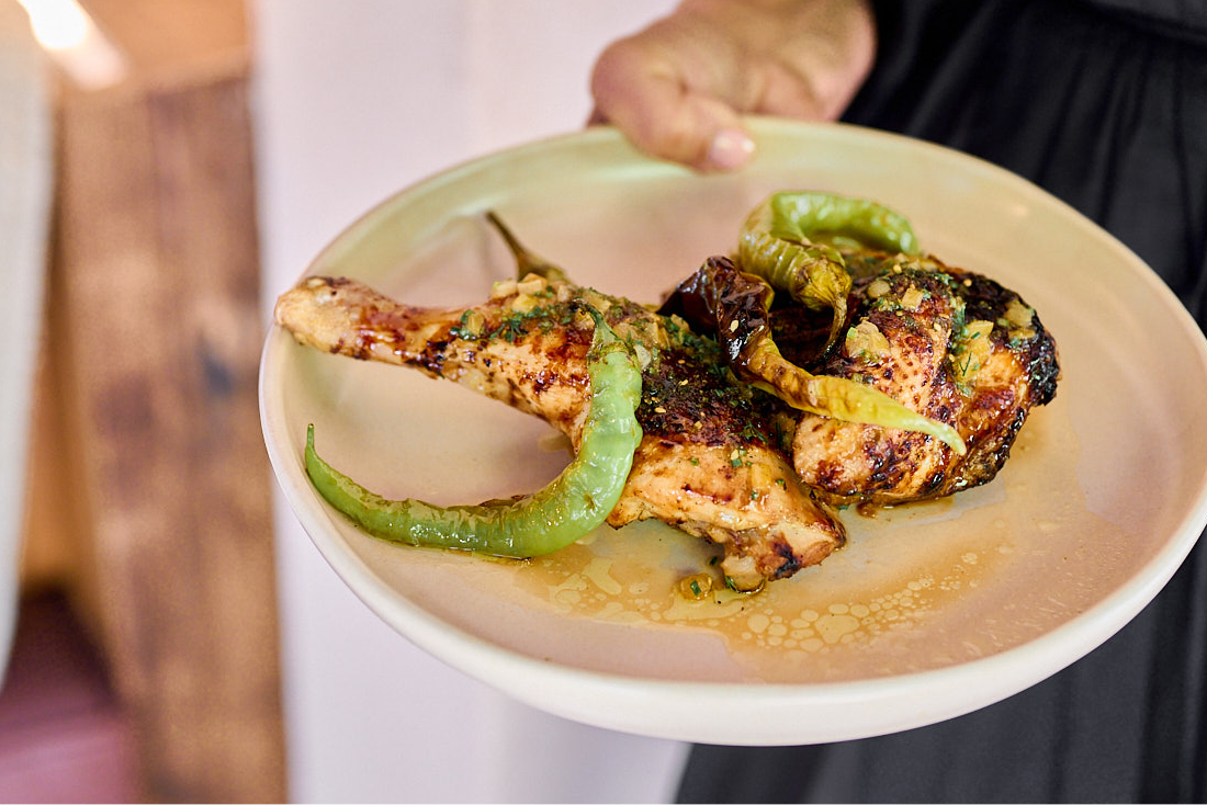 plate of grilled chicken with peppers