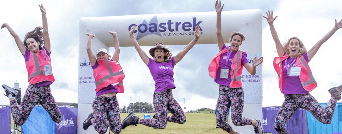 women leaping in the air