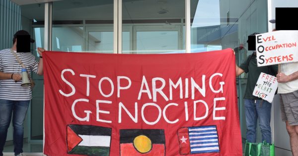 Pro-Palestine group protests at Canberra-based EOS Defence