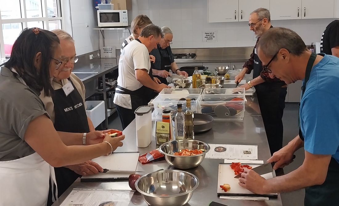 Men cooking in a kitchen