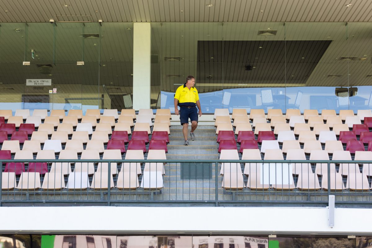 Man walking in grandstand