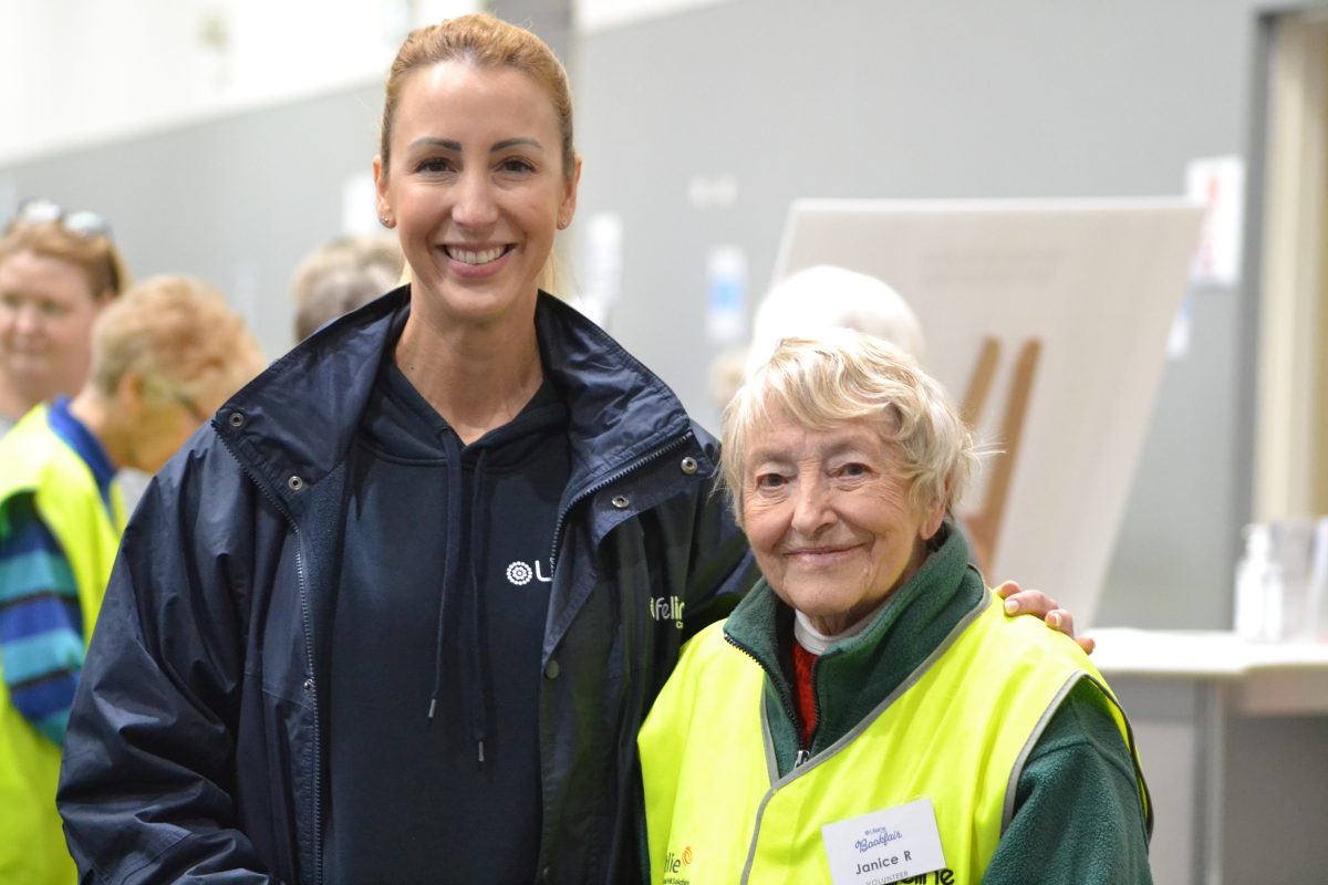 Carrie, Lifeline CEO and Janice, Lifeline volunteer smiling at the camera.