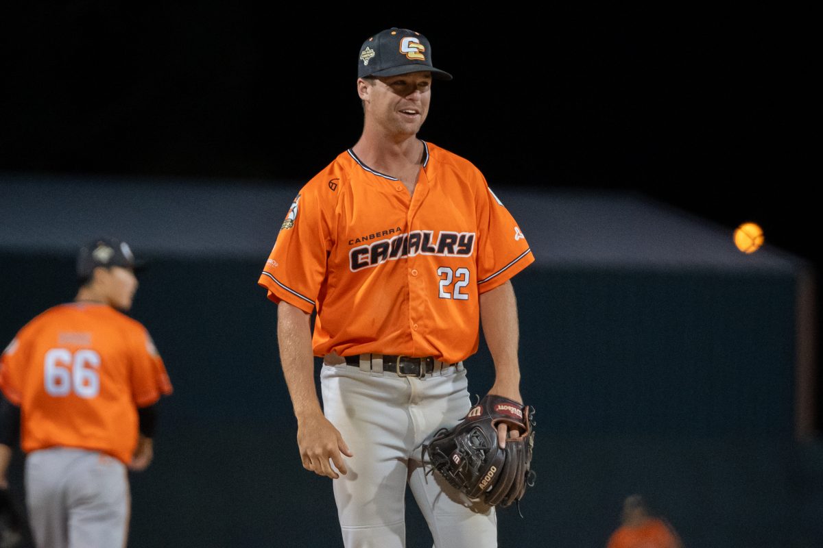 Cory Acton wearing a baseball glove