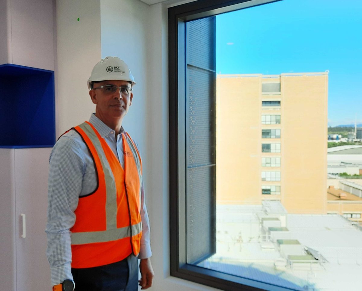 man in hard hat and hi-vis vest