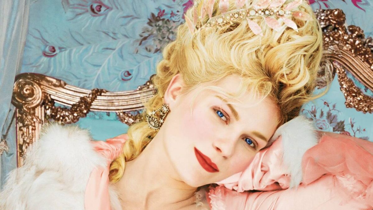 Still from Marie Antoinette showing a close up of a woman smiling