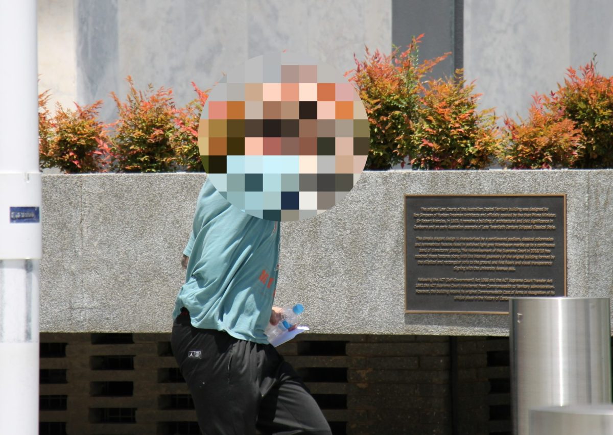 pixelated image of man running from court