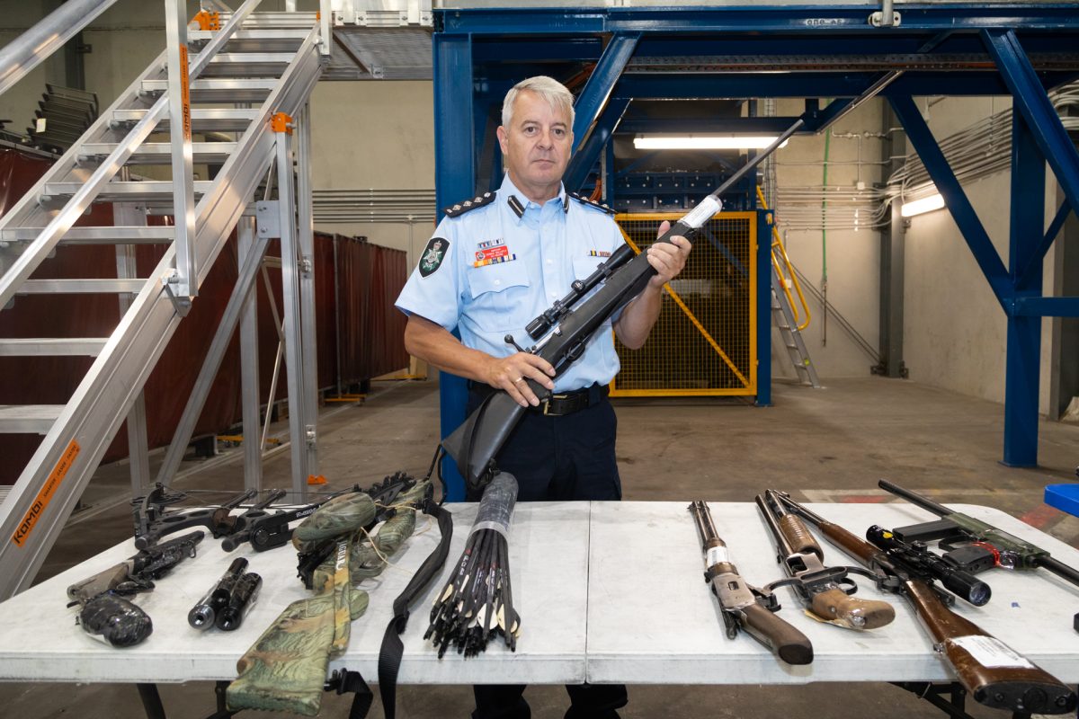 Police officer holding rifle