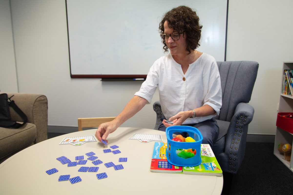 Tania with speech therapy tools