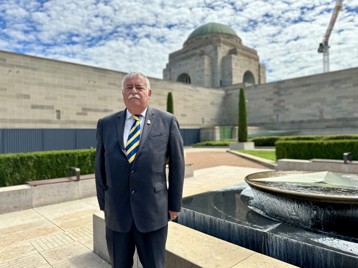 RSL ACT president John King standing at the War Memorial