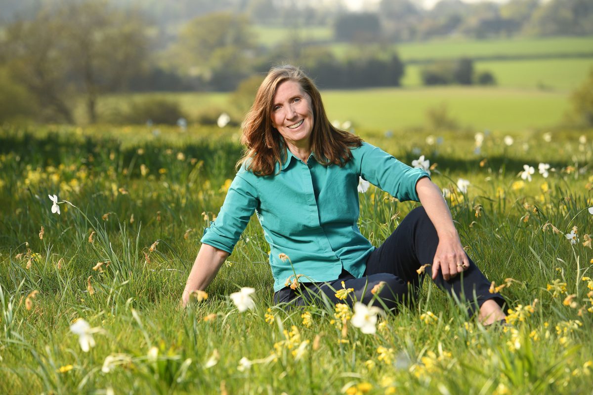 woman sitting on grass