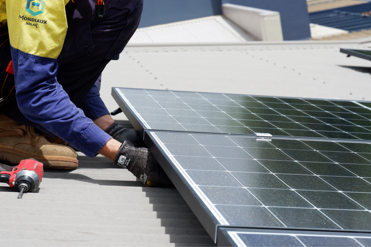 technician installing solar system