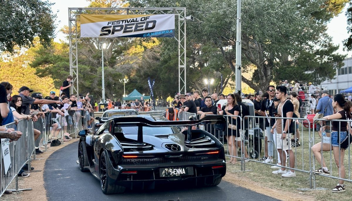 black car in crowd