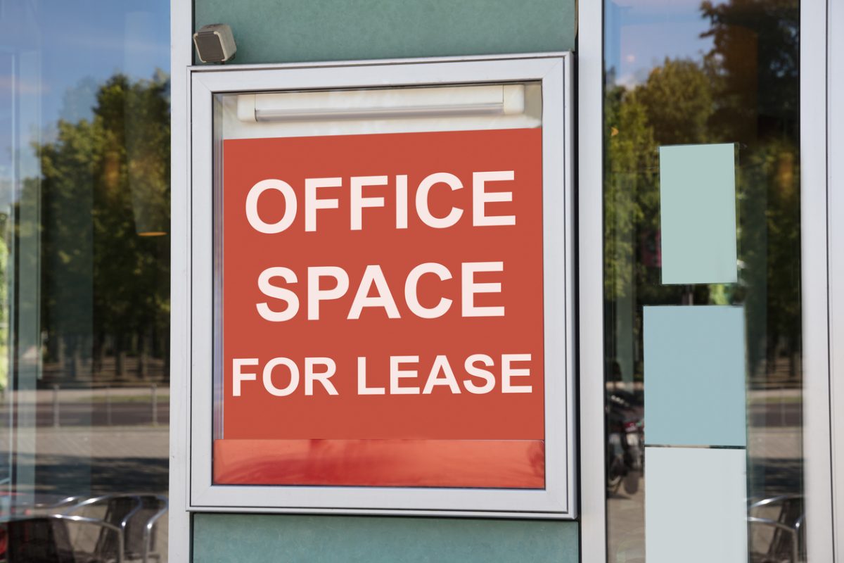 Sign in office window advertising office space for lease